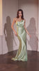 fitted satin dress, showcasing an asymmetrical strapless neckline and a beautifully pleated bodice