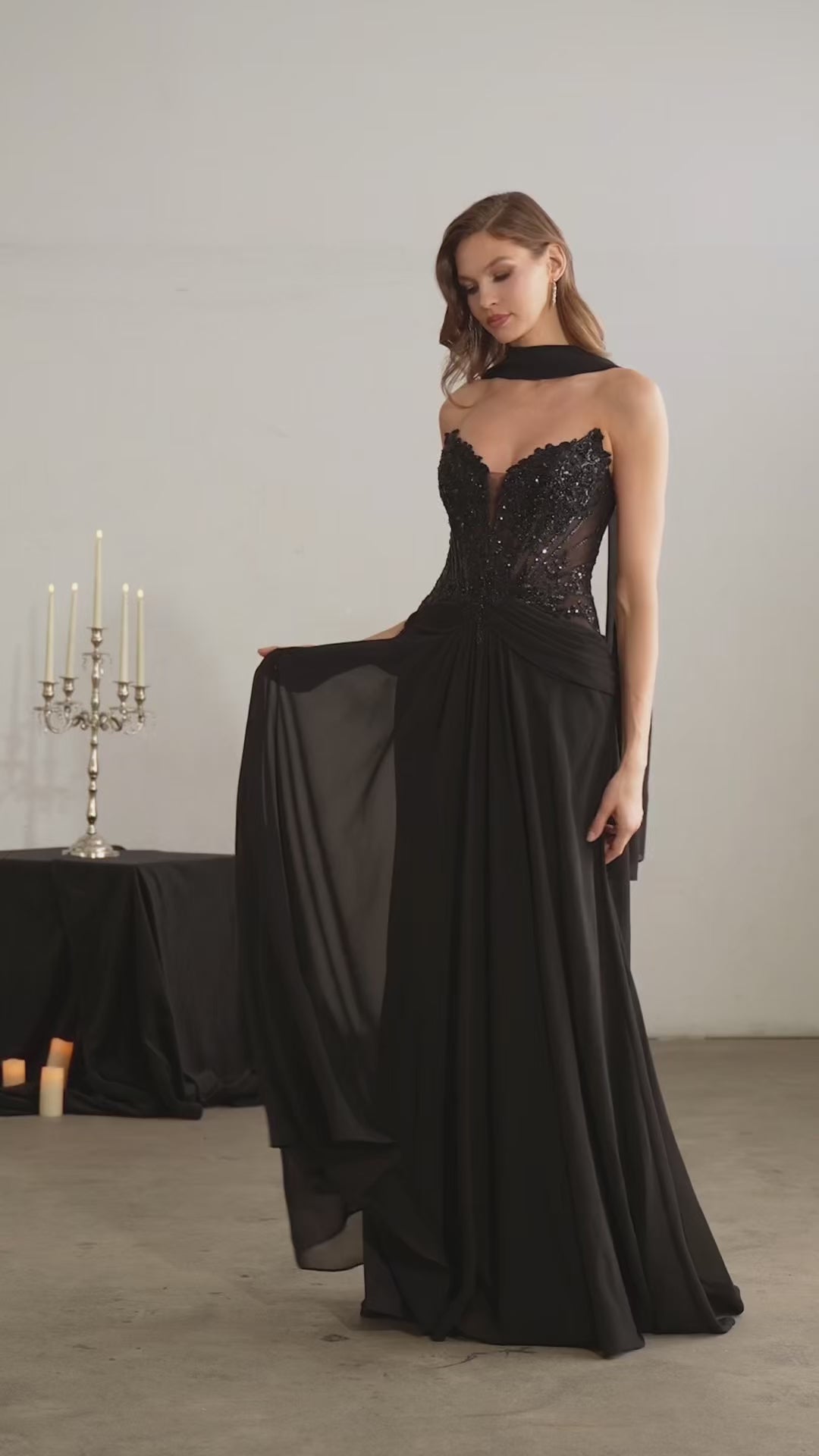  gown features a sweetheart illusion neckline paired with a shimmering, intricately beaded bodice 