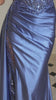 itted gown showcases a dramatic sweetheart neckline and a richly beaded bodice