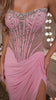fitted gown featuring a strapless sheer corset bodice and shimmering beaded embellishments