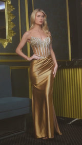 fitted dress features a strapless sweetheart neckline and a stunning beaded corset bodice