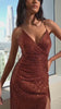 This stunning dress is fitted and has a ruched waistline for a figure-flattering silhouette