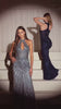 fitted gown featuring a chic halter keyhole neckline and a striking racerback design