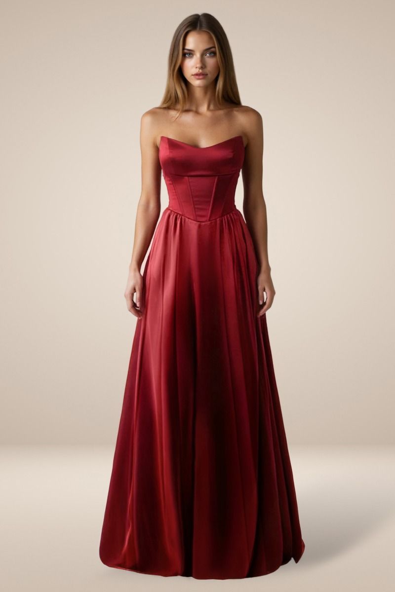 A-line gown features a structured strapless bodice with visible corset seaming and a lace-up back for adjustable support.