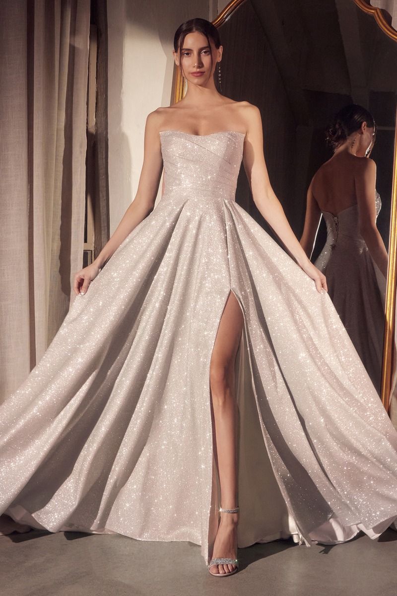 strapless glitter gown with a structured bodice and floor-length A-line skirt featuring a high slit