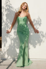 strapless floor-length gown with a fitted silhouette and draped bodice