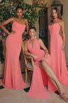 strapless floor-length gown with a fitted silhouette and draped bodice