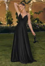 Model wearing a satin gown with draped cowl neckline, fitted waist, and floor-length skirt, featuring thin crisscross straps and open back