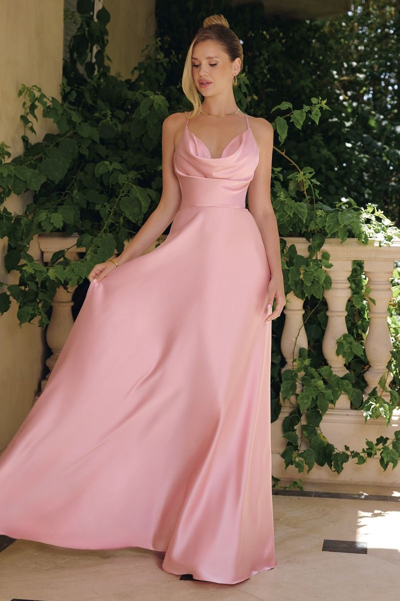 Model wearing a satin gown with draped cowl neckline, fitted waist, and floor-length skirt, featuring thin crisscross straps and open back