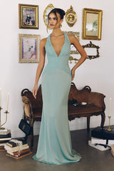 halter satin gown features soft pleated chiffon detailing that flatters the neckline and waist