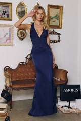 halter satin gown features soft pleated chiffon detailing that flatters the neckline and waist