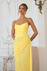 chiffon gown, designed with a sleek strapless neckline and soft, body-sculpting draping