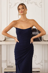 chiffon gown, designed with a sleek strapless neckline and soft, body-sculpting draping
