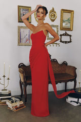 chiffon gown, designed with a sleek strapless neckline and soft, body-sculpting draping