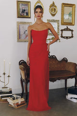 chiffon gown, designed with a sleek strapless neckline and soft, body-sculpting draping