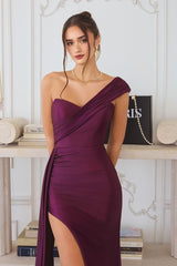 one-shoulder satin gown with pleated detailing and a floor-length draped skirt