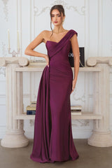 one-shoulder satin gown with pleated detailing and a floor-length draped skirt