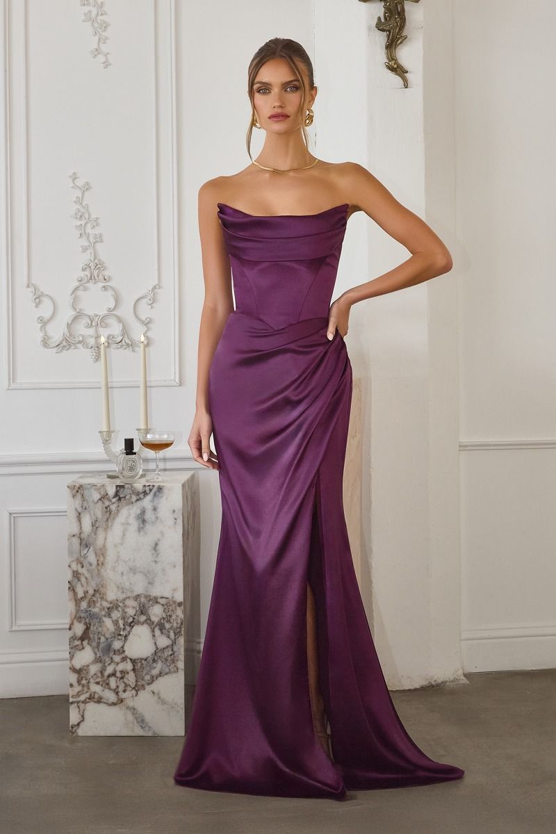 stretch satin gown features a softly draped neckline and a sculpted bodice