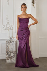 stretch satin gown features a softly draped neckline and a sculpted bodice