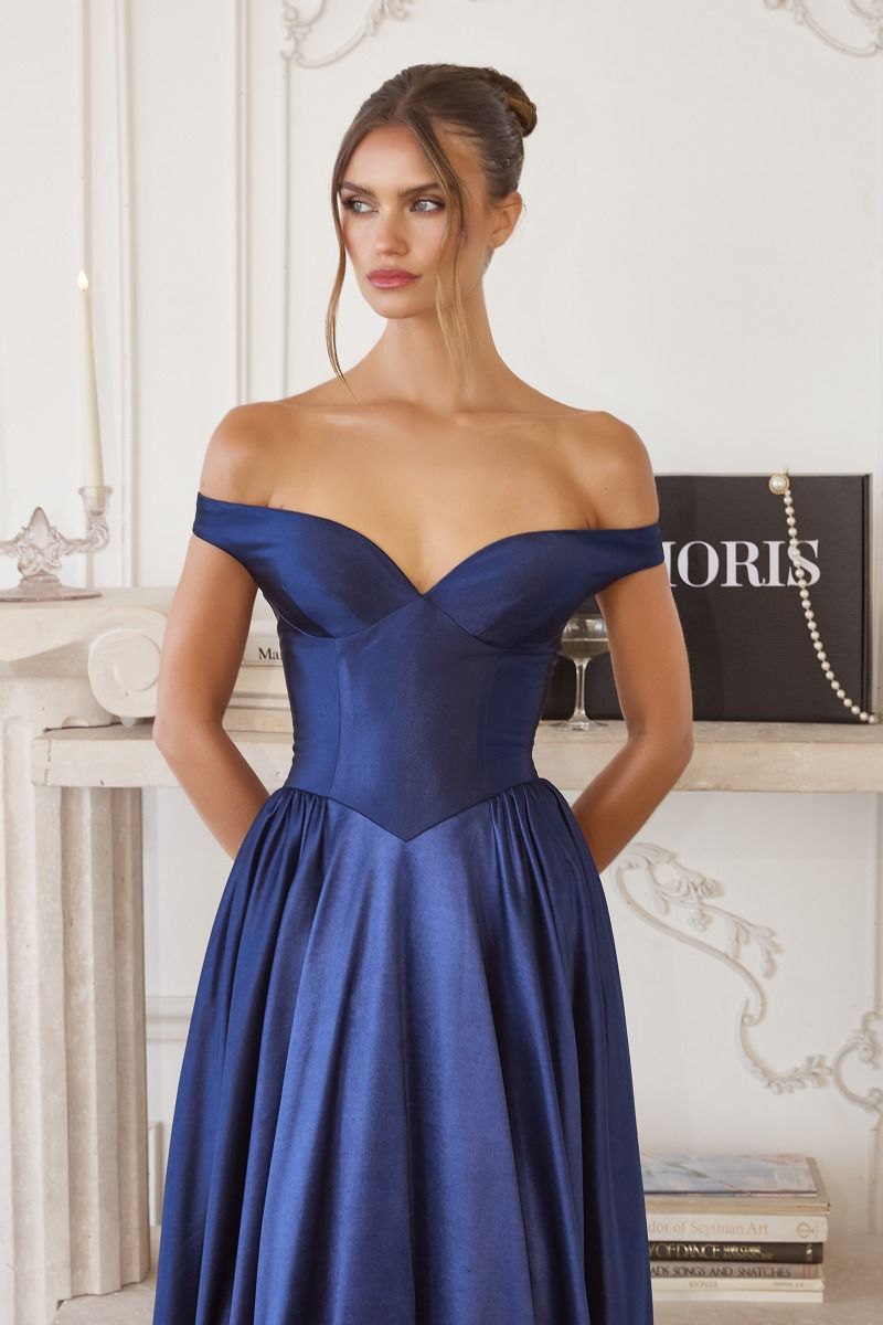 off-the-shoulder satin gown features a structured bodice and a flowing skirt