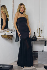 strapless gown features a structured satin bodice paired with a flowing chiffon skirt