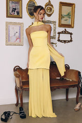 strapless gown features a structured satin bodice paired with a flowing chiffon skirt