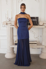 strapless gown features a structured satin bodice paired with a flowing chiffon skirt