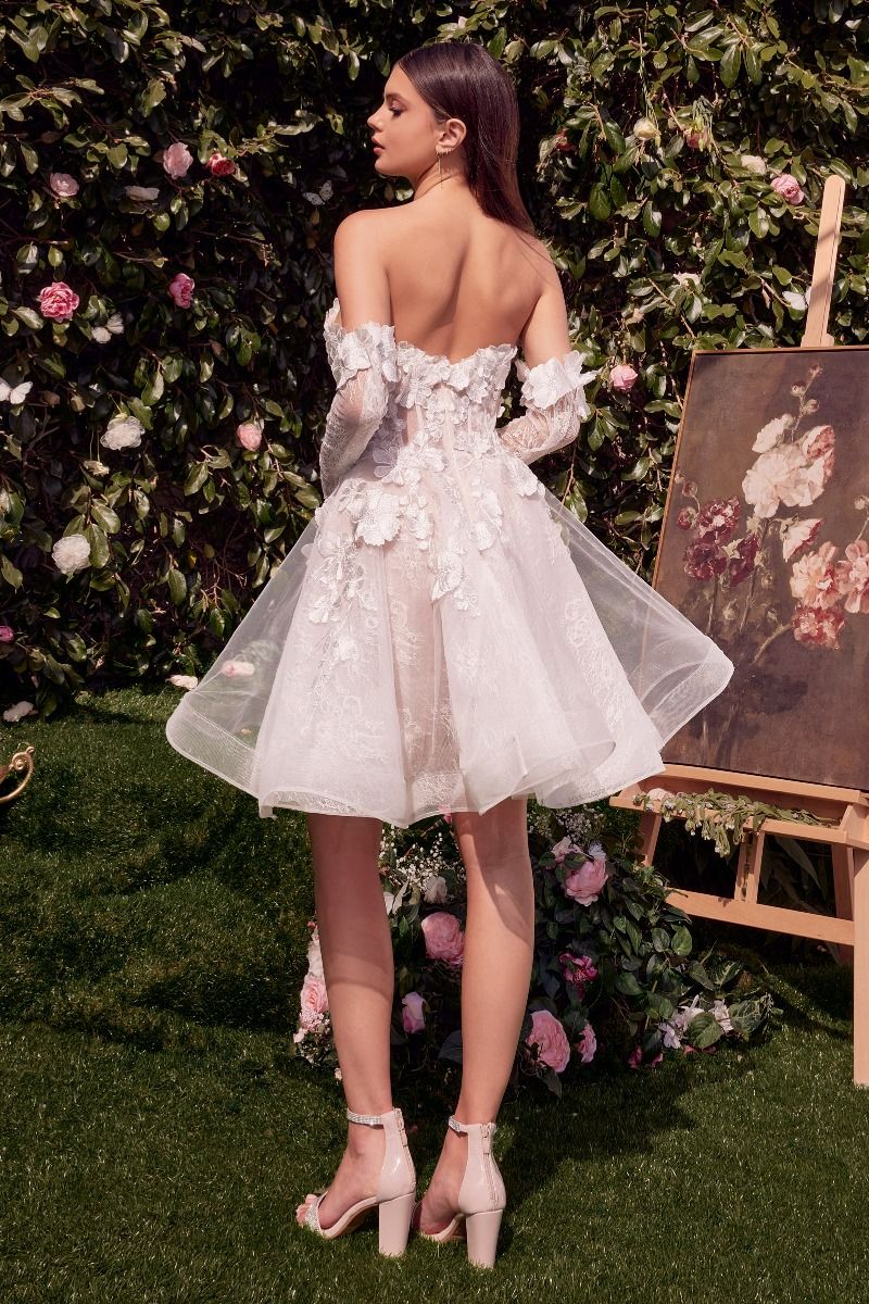 A-line dress features a strapless sweetheart neckline adorned with floral appliqué for a romantic touch 