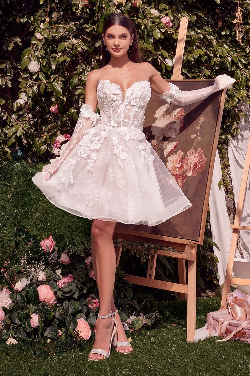 A-line dress features a strapless sweetheart neckline adorned with floral appliqué for a romantic touch 