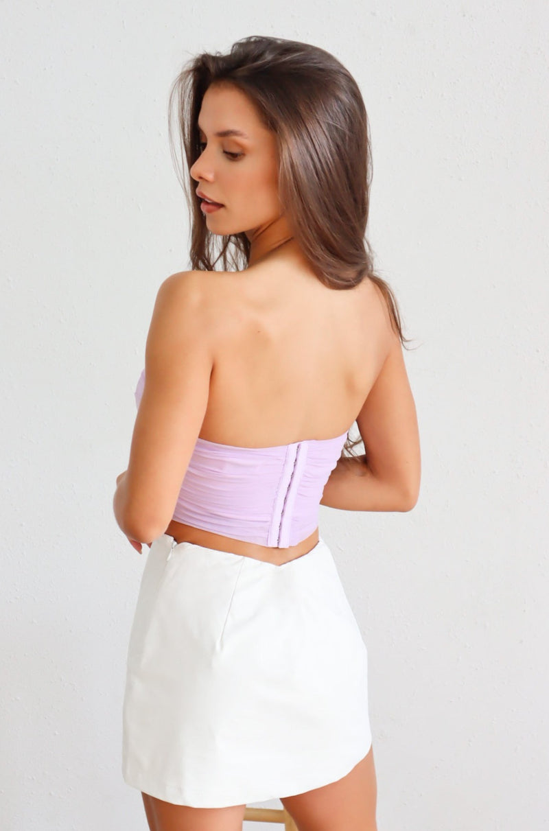 lavender strapless corset with white leather mini skort