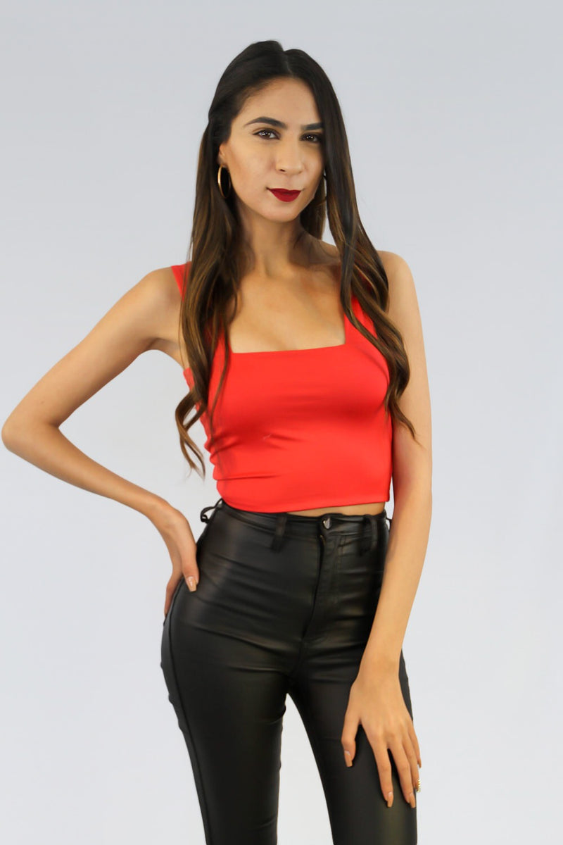 Tight cropped tank top in red.