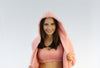 Three piece lounge set with a cardigan, bra top, and shorts.