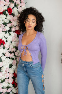 Long sleeve crop top with two string closures in lavender. 