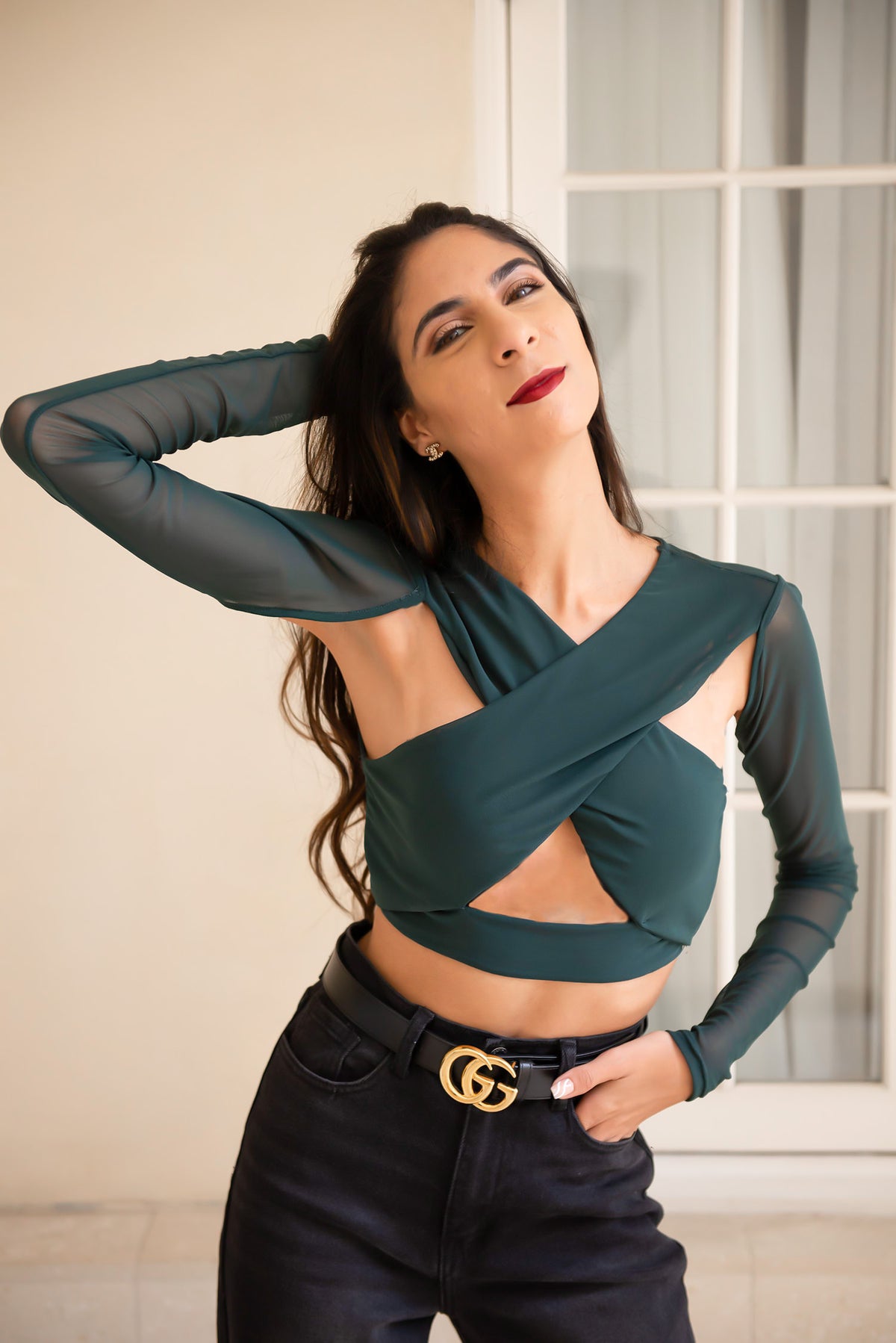 Crop top with cutouts and mesh long sleeve in Green.