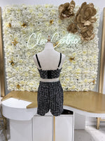Black tweed high waisted shorts paired with a tweed push up bustier.