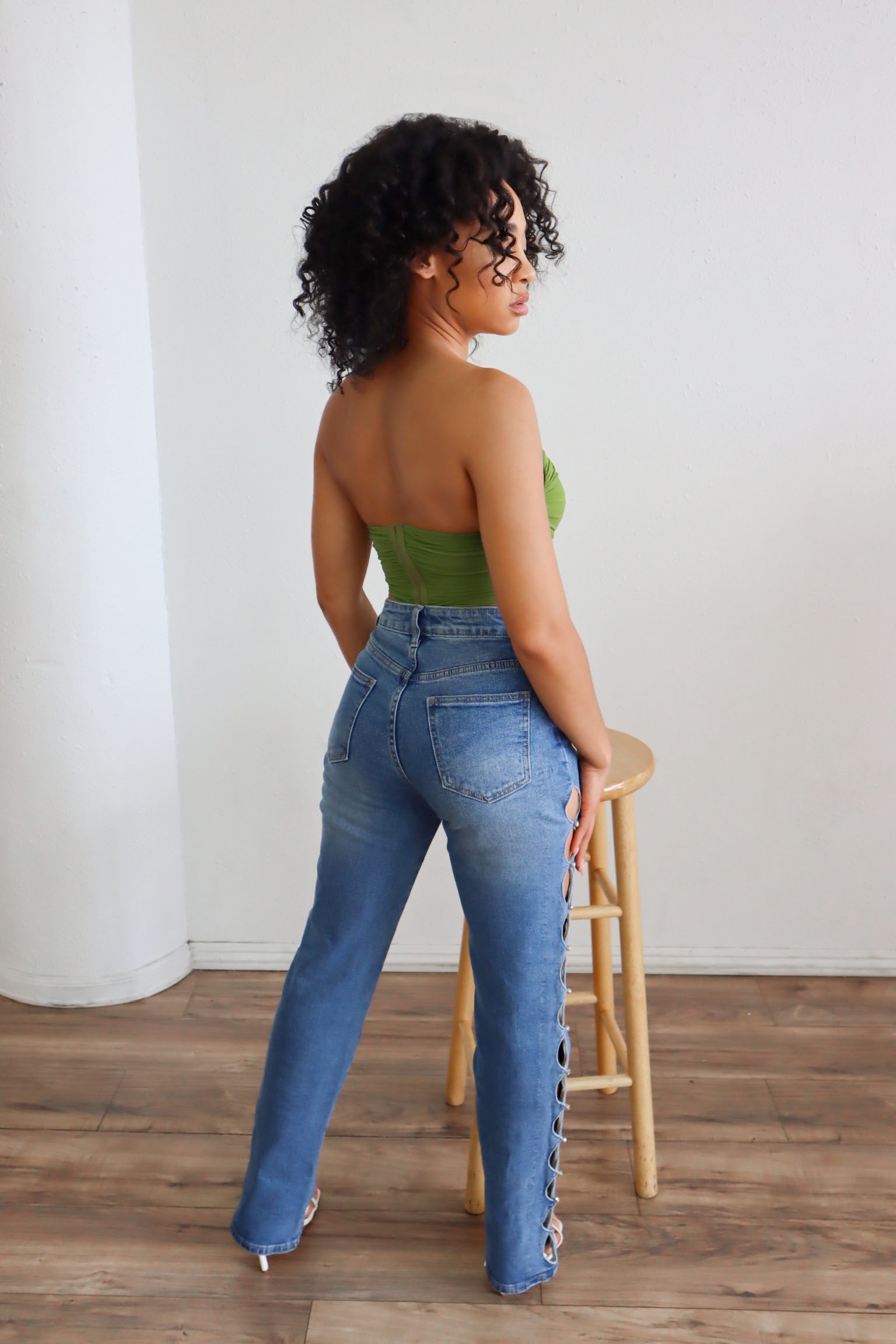 High waited pants with rhinestone cutouts.