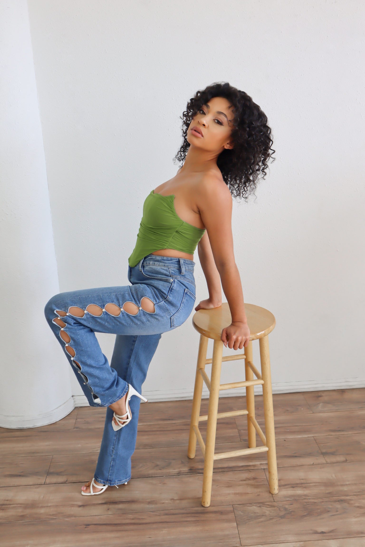 High waited pants with rhinestone cutouts.