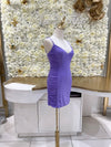 Purple ruched mini dress.