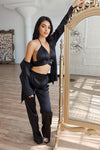 Satin bra top paired with Satin blazer and satin pants in black.