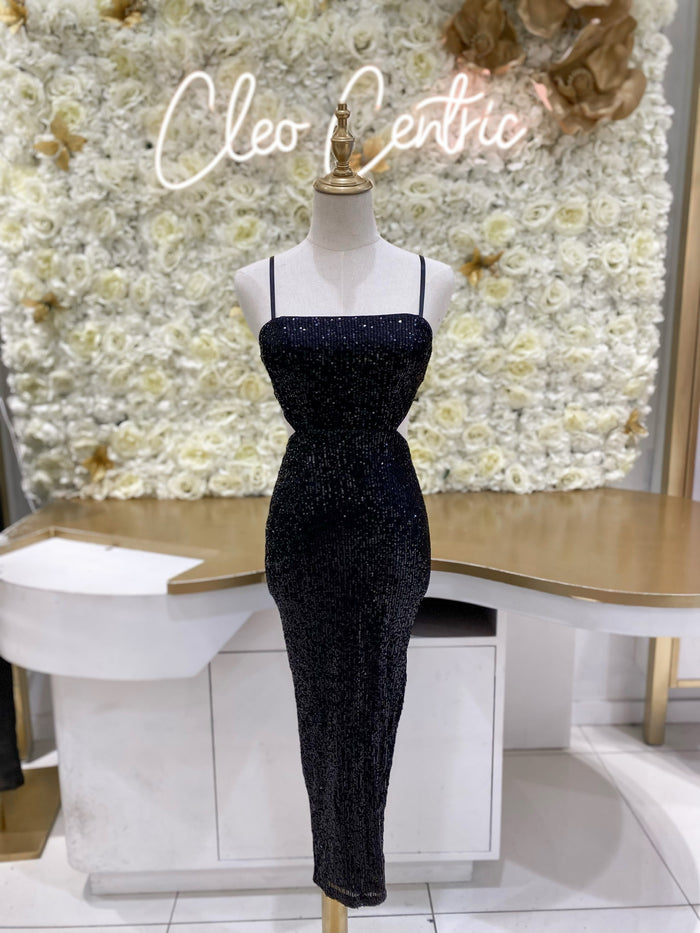 Sequin midi dress with side cutouts in black.