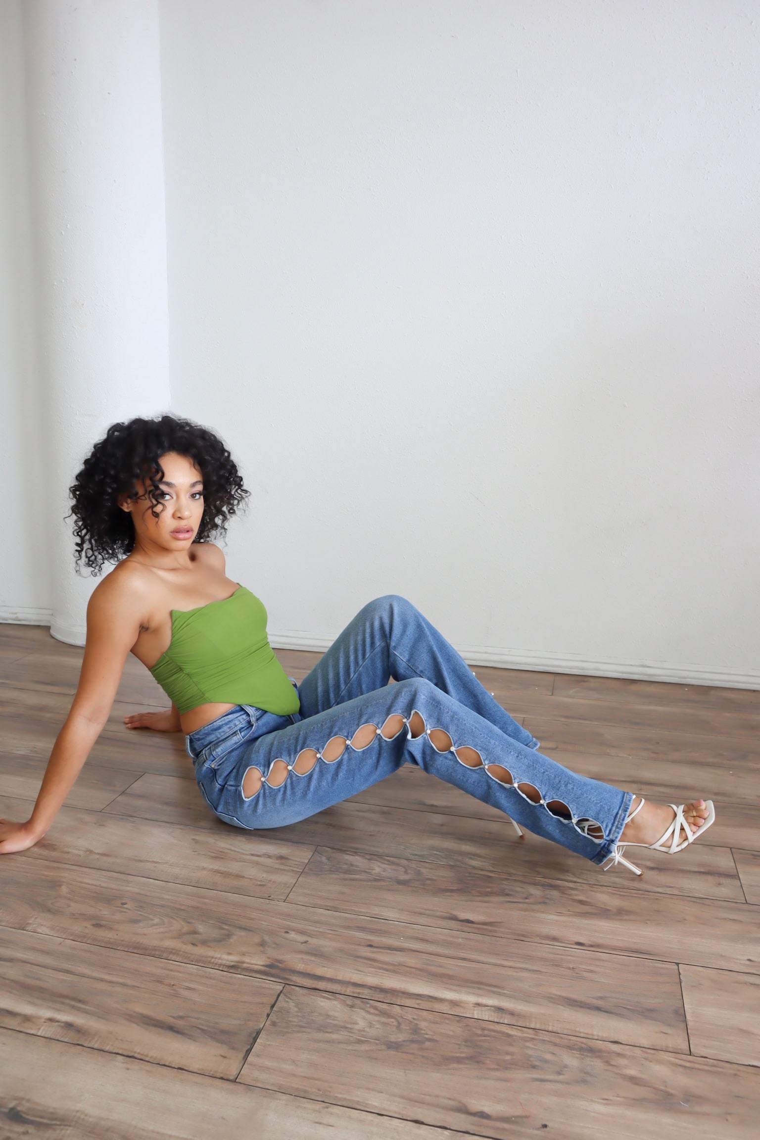 High waited pants with rhinestone cutouts.