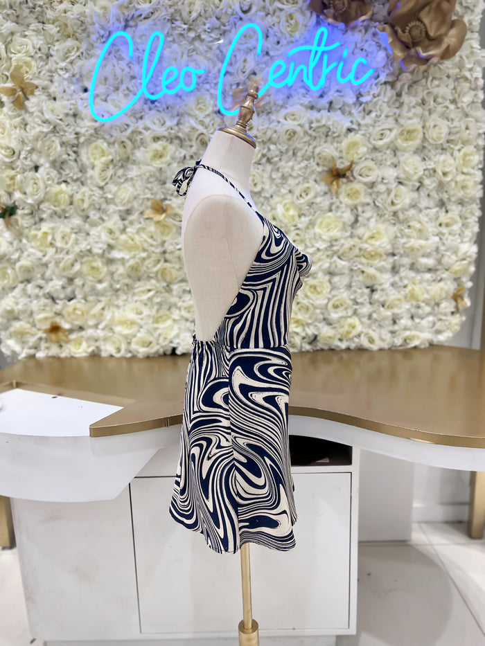Patterned slip dress with a low back.