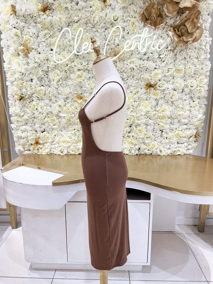 Backless midi dress with back slit, rhinestone strap detail, and adjustable straps in brown.