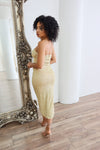 Gold strapless midi dress with rhinestones and pearls. 