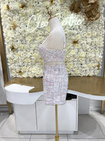 White tweed high waisted shorts paired with a tweed push up bustier.