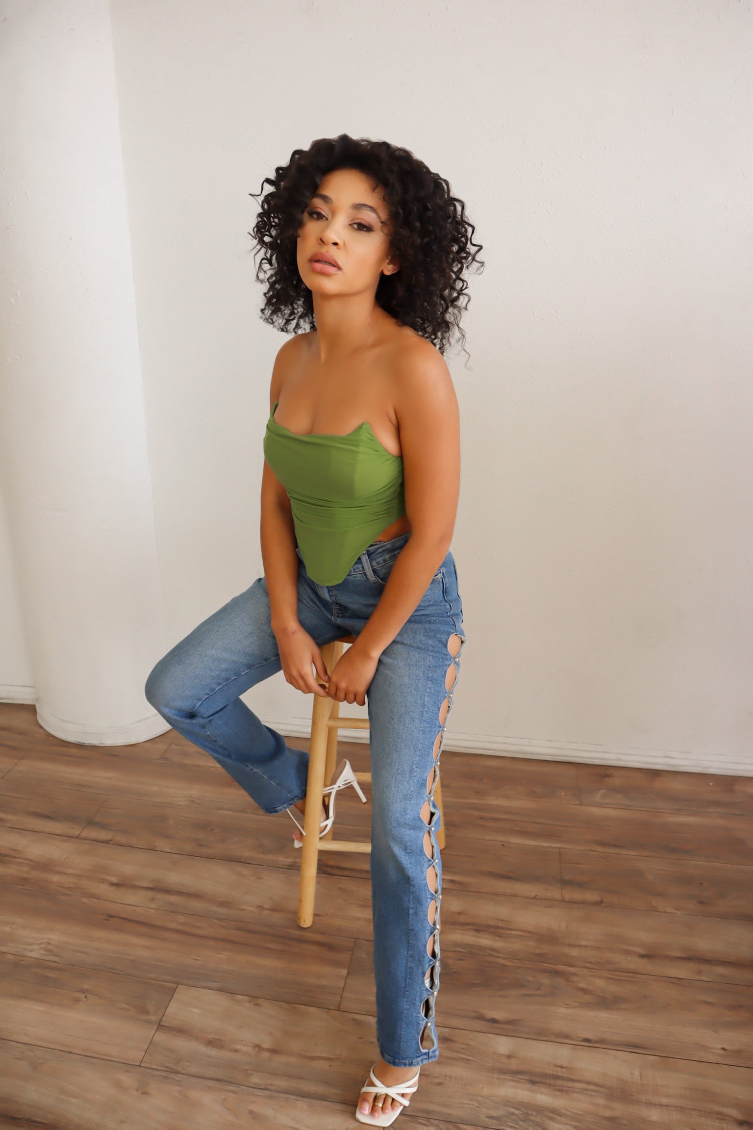 High waited pants with rhinestone cutouts.