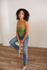 High waited pants with rhinestone cutouts.