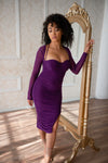 Purple ruched midi dress with mesh long sleeves, halter tie and slit. 