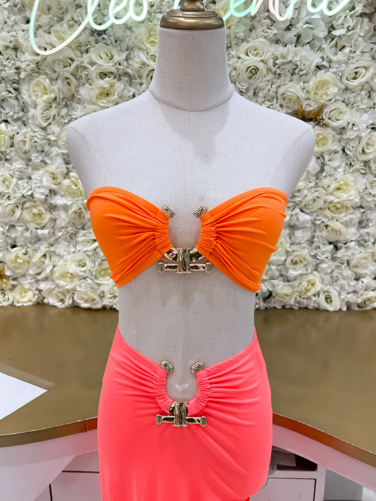 Orange Strapless bra top with plunging gold jewel design 