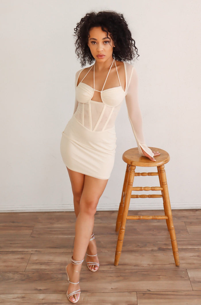 Long mesh sleeve corset style mini dress with halter neck in Cream.